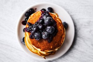 Coconut Gluten-Free Pancakes with Berry Syrup Recipe Image
