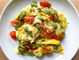 Scrambled Eggs With Pesto & Tomatoes Recipe Image