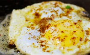 Refried Beans, Pico and Sunny Side Egg Breakfast Toast Recipe Image